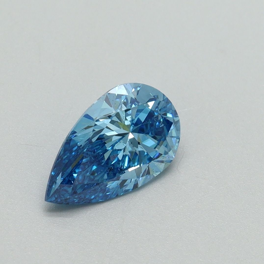 Loose Diamond - PEAR 1.01ct Fancy Vivid Blue VS2: Loose Diamond - PEAR 1.01ct Fancy Vivid Blue VS2 Source: This is a real non-mined Diamond that has been grown in a lab Shape: PEAR Carats: 1.01 Color: Fancy Vivid Blue Certification: IGI Video:
