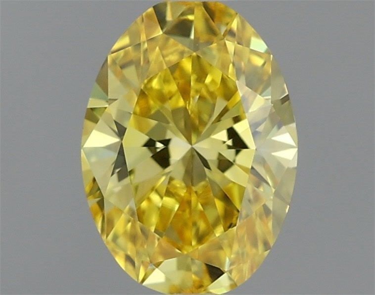 Loose Diamond - OVAL 0.51ct Fancy Vivid Yellow VVS2: Loose Diamond - OVAL 0.51ct Fancy Vivid Yellow VVS2 Source: This is a real non-mined Diamond that has been grown in a lab Shape: OVAL Carats: 0.51 Color: Fancy Vivid Yellow Certification: IGI Video: