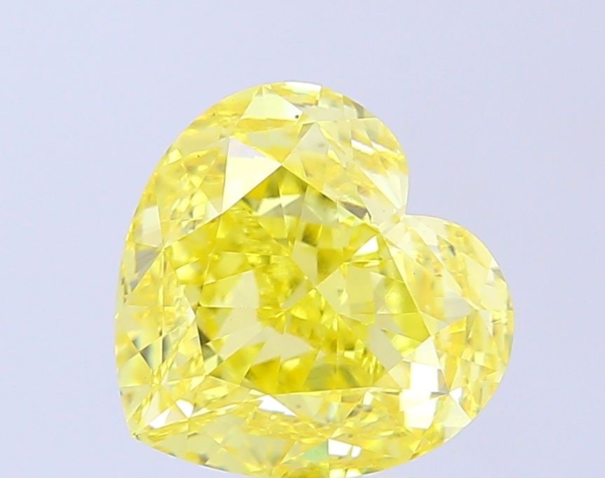 Loose Diamond - HEART 4.05ct Fancy Yellow VS1: Loose Diamond - HEART 4.05ct Fancy Yellow VS1 Source: This is a real non-mined Diamond that has been grown in a lab Shape: HEART Carats: 4.05 Color: Fancy Yellow Certification: IGI Video: