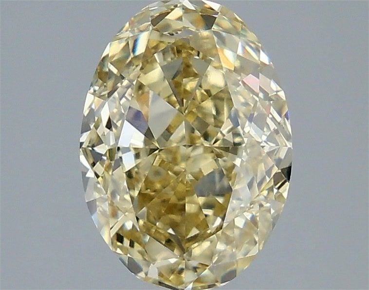 Loose Diamond - OVAL 2.58ct Fancy Yellow VVS2: Loose Diamond - OVAL 2.58ct Fancy Yellow VVS2 Source: This is a real non-mined Diamond that has been grown in a lab Shape: OVAL Carats: 2.58 Color: Fancy Yellow Certification: IGI Video: