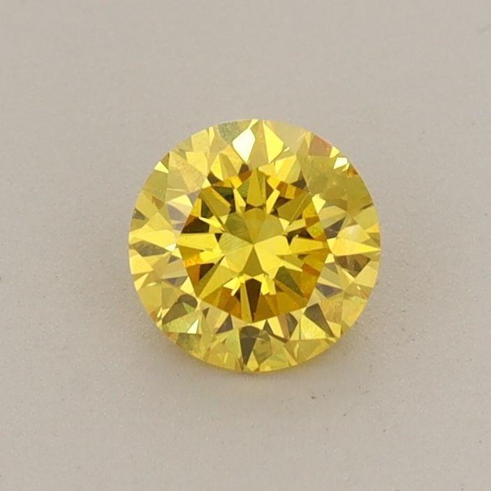 Loose Diamond - ROUND 0.45ct Fancy Vivid Yellow VS1: Loose Diamond - ROUND 0.45ct Fancy Vivid Yellow VS1 Source: This is a real non-mined Diamond that has been grown in a lab Shape: ROUND Carats: 0.45 Color: Fancy Vivid Yellow Certification: IGI Video: