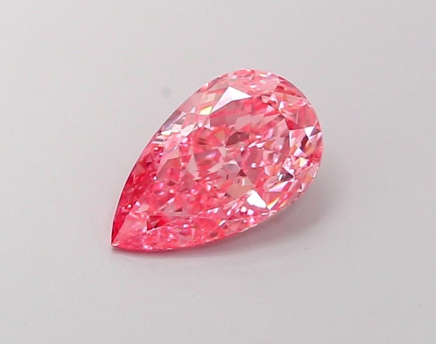 Loose Diamond - PEAR 1.31ct Fancy Vivid Pink VS1: Loose Diamond - PEAR 1.31ct Fancy Vivid Pink VS1 Source: This is a real non-mined Diamond that has been grown in a lab Shape: PEAR Carats: 1.31 Color: Fancy Vivid Pink Certification: IGI Video: