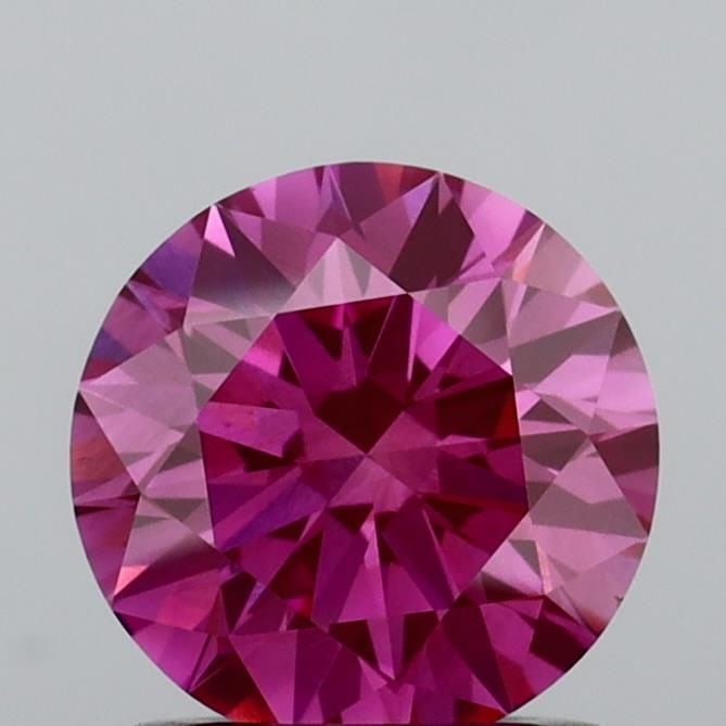 Ideal Loose Diamond - ROUND 1.0ct Fancy Vivid Pink VS2: Ideal Loose Diamond - ROUND 1.0ct Fancy Vivid Pink VS2 Source: This is a real non-mined Diamond that has been grown in a lab Shape: ROUND Carats: 1.0 Color: Fancy Vivid Pink Certification: IGI Video: