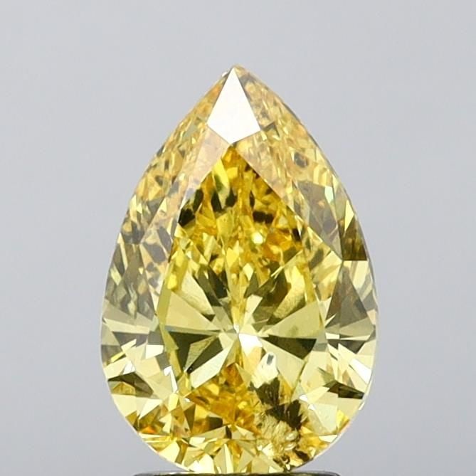 Loose Diamond - PEAR 3.47ct Fancy Vivid Yellow I1: Loose Diamond - PEAR 3.47ct Fancy Vivid Yellow I1 Source: This is a real non-mined Diamond that has been grown in a lab Shape: PEAR Carats: 3.47 Color: Fancy Vivid Yellow Certification: IGI Video: