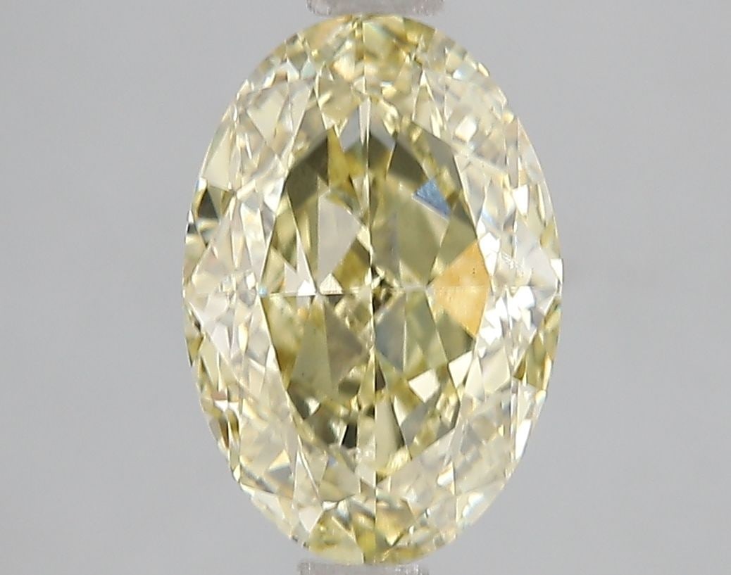 Loose Diamond - OVAL 3.01ct Fancy Intense Yellow SI1: Loose Diamond - OVAL 3.01ct Fancy Intense Yellow SI1 Source: This is a real non-mined Diamond that has been grown in a lab Shape: OVAL Carats: 3.01 Color: Fancy Intense Yellow Certification: IGI Video