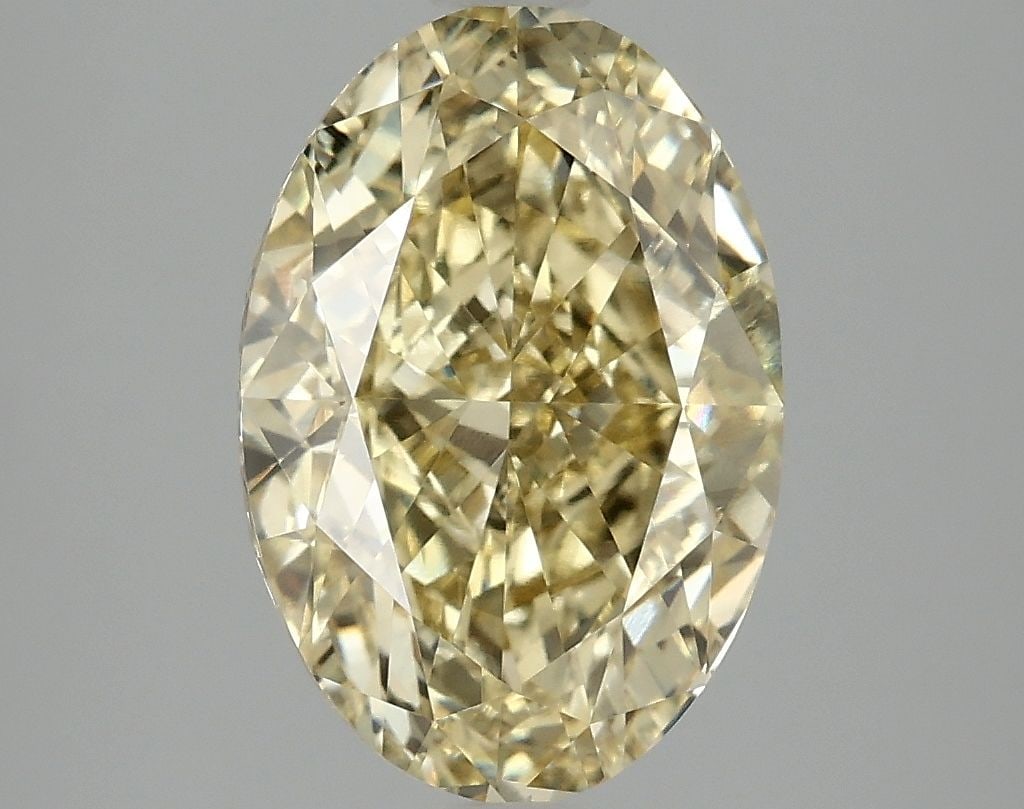 Loose Diamond - OVAL 3.08ct Fancy Vivid Yellow VS1: Loose Diamond - OVAL 3.08ct Fancy Vivid Yellow VS1 Source: This is a real non-mined Diamond that has been grown in a lab Shape: OVAL Carats: 3.08 Color: Fancy Vivid Yellow Certification: IGI Video:
