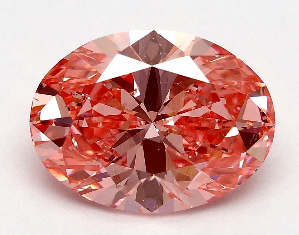 Loose Diamond - OVAL 2.22ct Fancy Vivid Pink SI1: Loose Diamond - OVAL 2.22ct Fancy Vivid Pink SI1 Source: This is a real non-mined Diamond that has been grown in a lab Shape: OVAL Carats: 2.22 Color: Fancy Vivid Pink Certification: IGI Video: