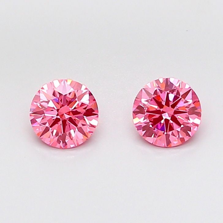 Ideal Loose Diamond - ROUND 1.0ct Fancy Vivid Pink VVS2: Ideal Loose Diamond - ROUND 1.0ct Fancy Vivid Pink VVS2 Source: This is a real non-mined Diamond that has been grown in a lab Shape: ROUND Carats: 1.0 Color: Fancy Vivid Pink Certification: IGI Video: