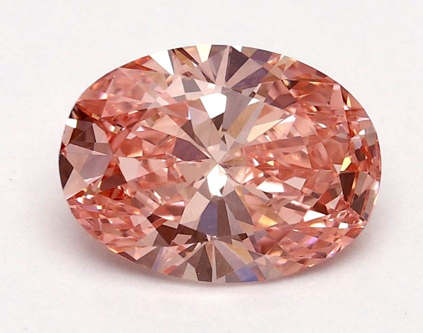 Loose Diamond - OVAL 1.01ct Fancy Vivid Pink VS2: Loose Diamond - OVAL 1.01ct Fancy Vivid Pink VS2 Source: This is a real non-mined Diamond that has been grown in a lab Shape: OVAL Carats: 1.01 Color: Fancy Vivid Pink Certification: IGI Video: