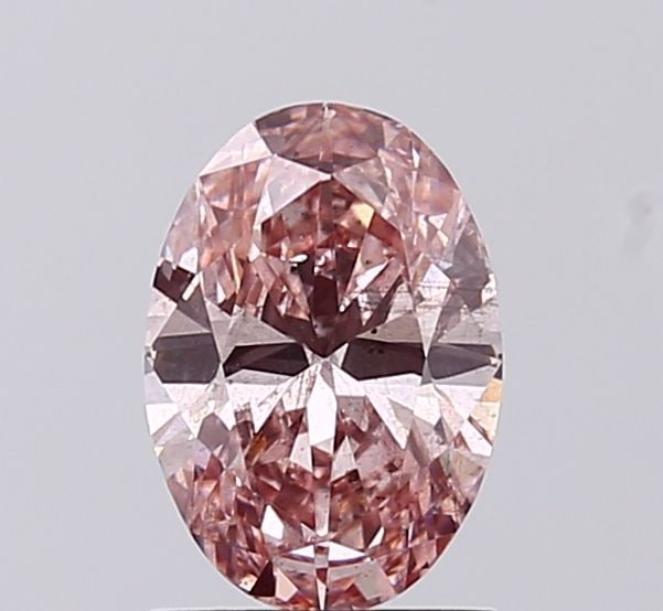 Loose Diamond - OVAL 1.0ct Fancy Intense Pink SI2: Loose Diamond - OVAL 1.0ct Fancy Intense Pink SI2 Source: This is a real non-mined Diamond that has been grown in a lab Shape: OVAL Carats: 1.0 Color: Fancy Intense Pink Certification: IGI Video: