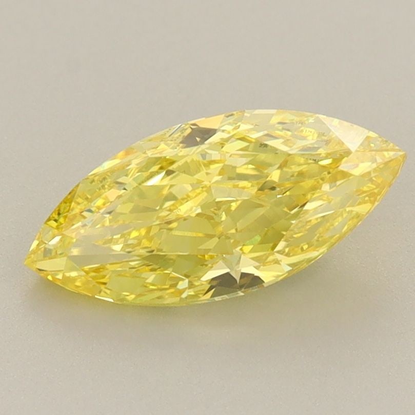 Loose Diamond - MARQUISE 1.29ct Fancy Vivid Yellow VVS2: Loose Diamond - MARQUISE 1.29ct Fancy Vivid Yellow VVS2 Source: This is a real non-mined Diamond that has been grown in a lab Shape: MARQUISE Carats: 1.29 Color: Fancy Vivid Yellow Certification: IGI 