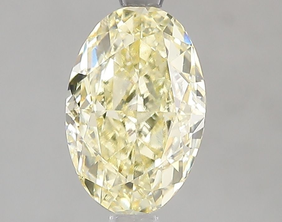 Loose Diamond - OVAL 2.07ct Fancy Yellow VVS2: Loose Diamond - OVAL 2.07ct Fancy Yellow VVS2 Source: This is a real non-mined Diamond that has been grown in a lab Shape: OVAL Carats: 2.07 Color: Fancy Yellow Certification: IGI Video: