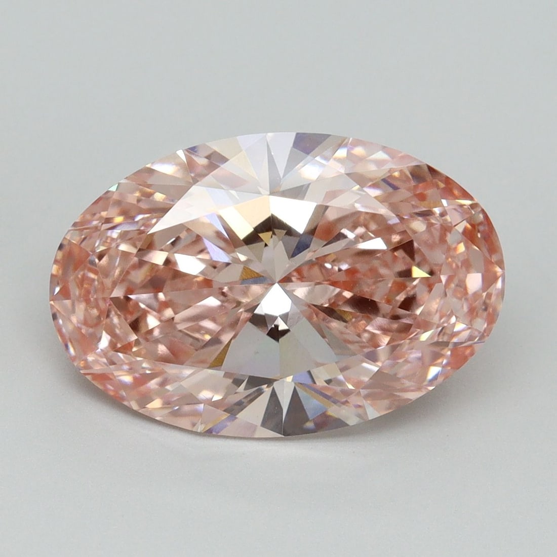 Loose Diamond - OVAL 5.15ct Fancy Vivid Pink VVS2: Loose Diamond - OVAL 5.15ct Fancy Vivid Pink VVS2 Source: This is a real non-mined Diamond that has been grown in a lab Shape: OVAL Carats: 5.15 Color: Fancy Vivid Pink Certification: IGI Video: