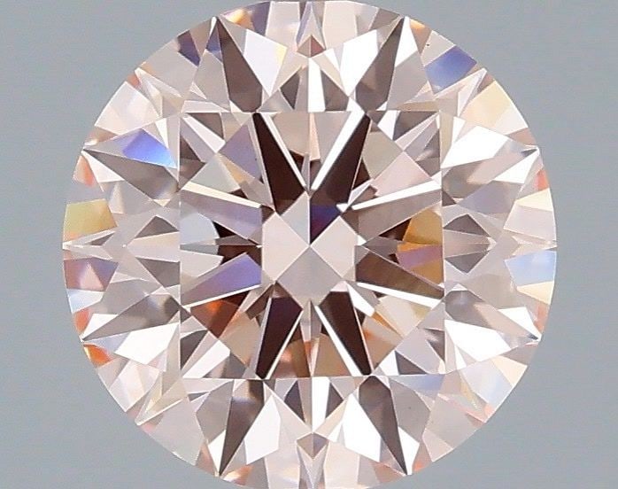 Ideal Loose Diamond - ROUND 2.16ct Fancy Pink VVS2: Ideal Loose Diamond - ROUND 2.16ct Fancy Pink VVS2 Source: This is a real non-mined Diamond that has been grown in a lab Shape: ROUND Carats: 2.16 Color: Fancy Pink Certification: IGI Video: