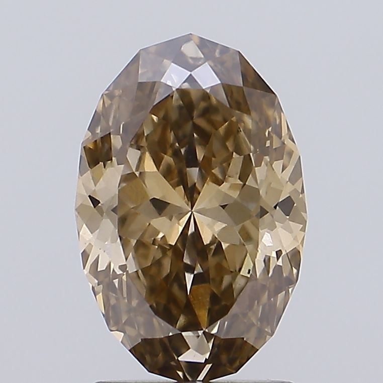 Loose Diamond - OVAL 2.02ct Fancy Brown VS1: Loose Diamond - OVAL 2.02ct Fancy Brown VS1 Source: This is a real non-mined Diamond that has been grown in a lab Shape: OVAL Carats: 2.02 Color: Fancy Brown Certification: IGI Video: