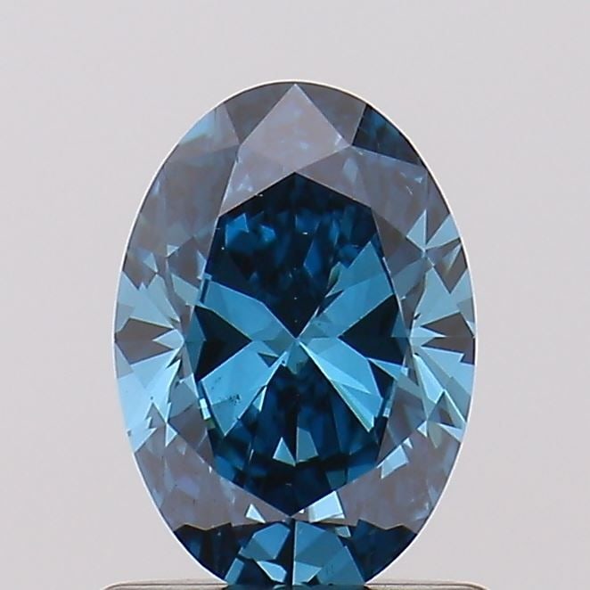 Loose Diamond - OVAL 0.7ct Fancy Vivid Blue VS2: Loose Diamond - OVAL 0.7ct Fancy Vivid Blue VS2 Source: This is a real non-mined Diamond that has been grown in a lab Shape: OVAL Carats: 0.7 Color: Fancy Vivid Blue Certification: NONE Video: