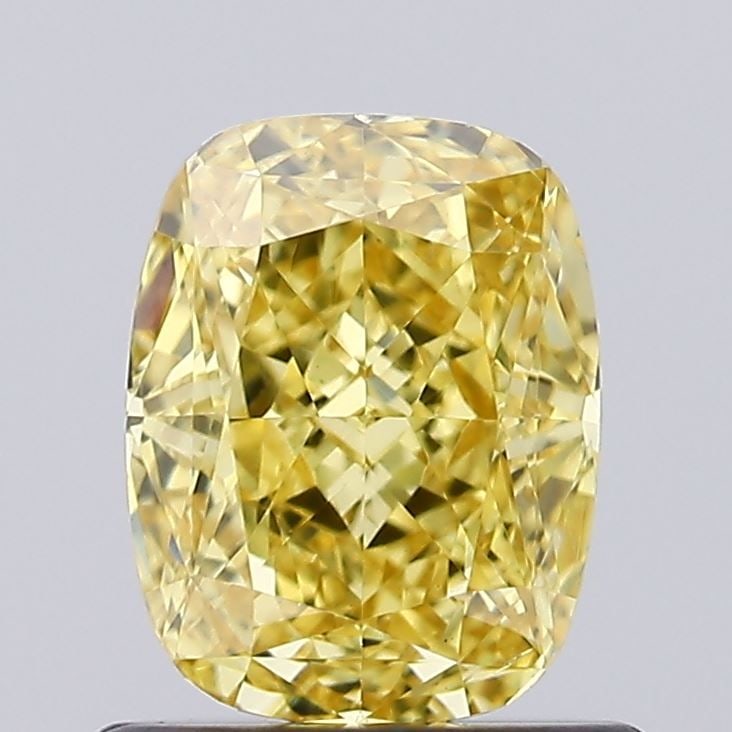 Loose Diamond - CUSHION MODIFIED 0.93ct Fancy Vivid Yellow VS2: Loose Diamond - CUSHION MODIFIED 0.93ct Fancy Vivid Yellow VS2 Source: This is a real non-mined Diamond that has been grown in a lab Shape: CUSHION MODIFIED Carats: 0.93 Color: Fancy Vivid Yellow Cert