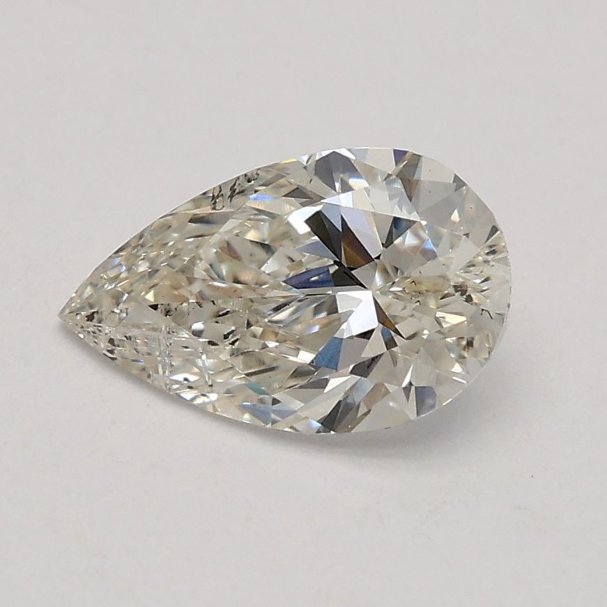 Loose Diamond - PEAR 0.73ct H SI2: Loose Diamond - PEAR 0.73ct H SI2 Source: This is a real non-mined Diamond that has been grown in a lab Shape: PEAR Carats: 0.73 Color: H Clarity: SI2 Certification: IGI Video: Video Link Additional