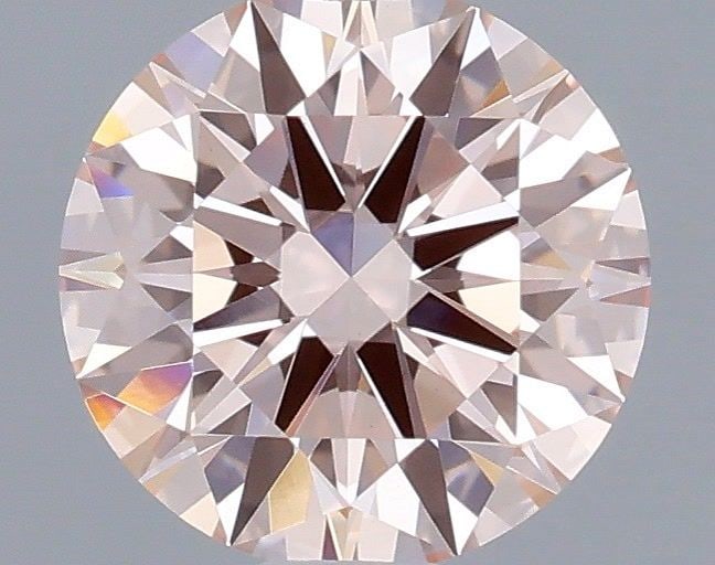 Ideal Loose Diamond - ROUND 0.71ct Fancy Pink VVS2: Ideal Loose Diamond - ROUND 0.71ct Fancy Pink VVS2 Source: This is a real non-mined Diamond that has been grown in a lab Shape: ROUND Carats: 0.71 Color: Fancy Pink Certification: IGI Video: Video