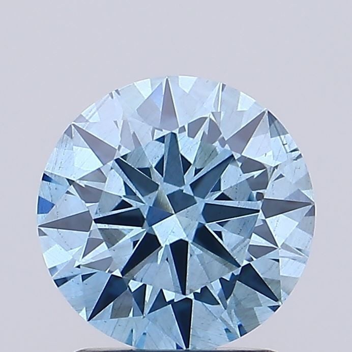 Loose Diamond - ROUND 1.55ct Fancy Vivid Blue SI1: Loose Diamond - ROUND 1.55ct Fancy Vivid Blue SI1 Source: This is a real non-mined Diamond that has been grown in a lab Shape: ROUND Carats: 1.55 Color: Fancy Vivid Blue Certification: IGI Video: