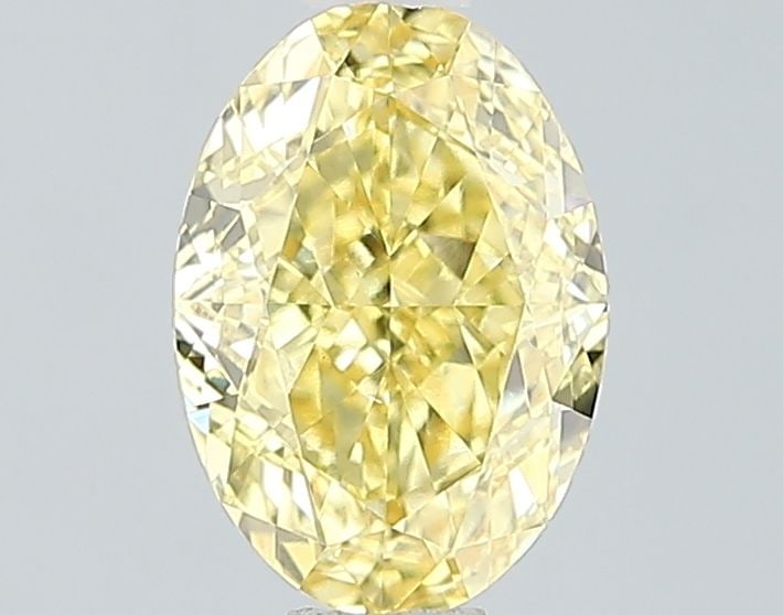 Loose Diamond - OVAL 1.45ct Fancy Vivid Yellow VS1: Loose Diamond - OVAL 1.45ct Fancy Vivid Yellow VS1 Source: This is a real non-mined Diamond that has been grown in a lab Shape: OVAL Carats: 1.45 Color: Fancy Vivid Yellow Certification: IGI Video:
