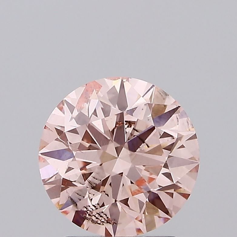 Loose Diamond - ROUND 2.11ct Fancy Vivid Pink SI2: Loose Diamond - ROUND 2.11ct Fancy Vivid Pink SI2 Source: This is a real non-mined Diamond that has been grown in a lab Shape: ROUND Carats: 2.11 Color: Fancy Vivid Pink Certification: IGI Video: