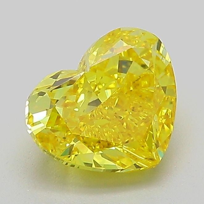 Loose Diamond - HEART 1.49ct Fancy Vivid Yellow VVS2: Loose Diamond - HEART 1.49ct Fancy Vivid Yellow VVS2 Source: This is a real non-mined Diamond that has been grown in a lab Shape: HEART Carats: 1.49 Color: Fancy Vivid Yellow Certification: IGI Video: