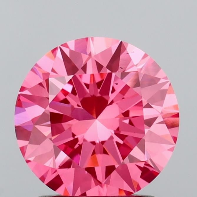 Loose Diamond - ROUND 1.5ct Fancy Vivid Pink VS2: Loose Diamond - ROUND 1.5ct Fancy Vivid Pink VS2 Source: This is a real non-mined Diamond that has been grown in a lab Shape: ROUND Carats: 1.5 Color: Fancy Vivid Pink Certification: IGI Video: Video
