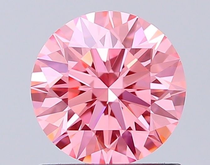 Ideal Loose Diamond - ROUND 1.03ct Fancy Vivid Pink VVS2: Ideal Loose Diamond - ROUND 1.03ct Fancy Vivid Pink VVS2 Source: This is a real non-mined Diamond that has been grown in a lab Shape: ROUND Carats: 1.03 Color: Fancy Vivid Pink Certification: IGI Vide
