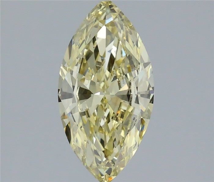 Loose Diamond - MARQUISE 1.26ct Fancy Yellow VS1: Loose Diamond - MARQUISE 1.26ct Fancy Yellow VS1 Source: This is a real non-mined Diamond that has been grown in a lab Shape: MARQUISE Carats: 1.26 Color: Fancy Yellow Certification: IGI Video: