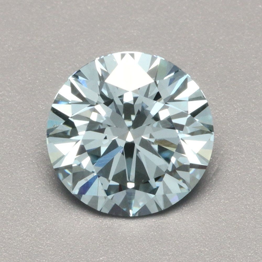 Ideal Loose Diamond - ROUND 1.05ct Fancy Vivid Blue VVS2: Ideal Loose Diamond - ROUND 1.05ct Fancy Vivid Blue VVS2 Source: This is a real non-mined Diamond that has been grown in a lab Shape: ROUND Carats: 1.05 Color: Fancy Vivid Blue Certification: IGI Vide