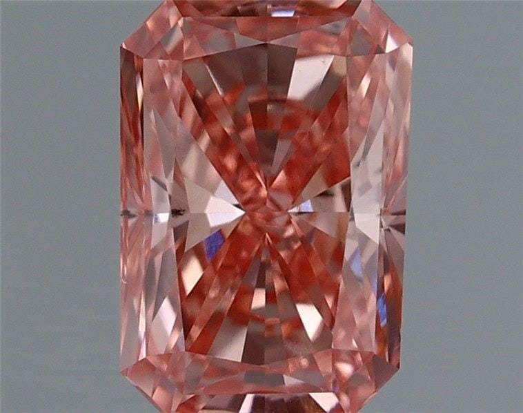 Loose Diamond - RADIANT 0.89ct Fancy Vivid Pink VS2: Loose Diamond - RADIANT 0.89ct Fancy Vivid Pink VS2 Source: This is a real non-mined Diamond that has been grown in a lab Shape: RADIANT Carats: 0.89 Color: Fancy Vivid Pink Certification: IGI Video: