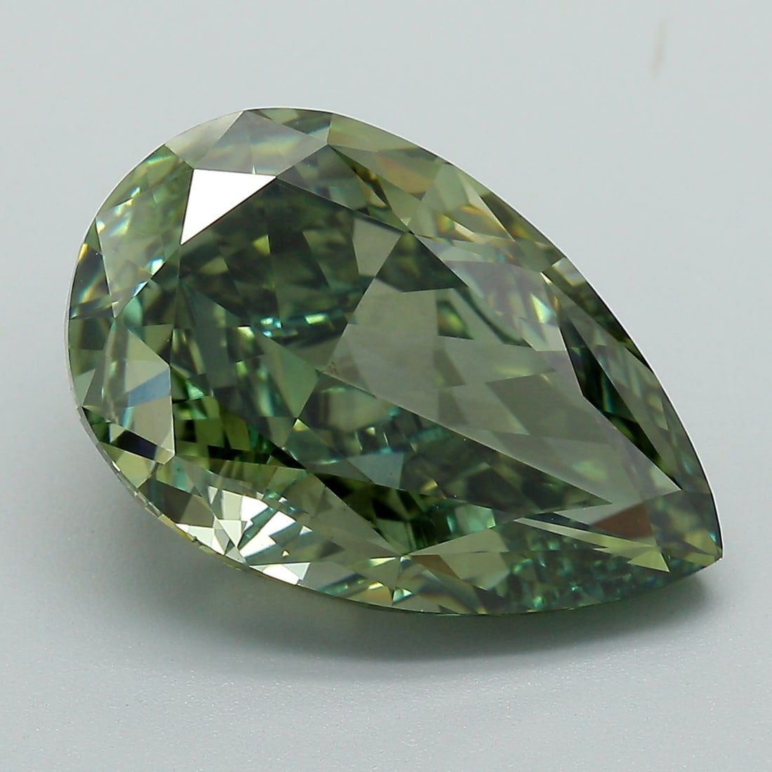 Loose Diamond - PEAR 9.25ct Fancy Vivid Green VVS2: Loose Diamond - PEAR 9.25ct Fancy Vivid Green VVS2 Source: This is a real non-mined Diamond that has been grown in a lab Shape: PEAR Carats: 9.25 Color: Fancy Vivid Green Certification: IGI Video: