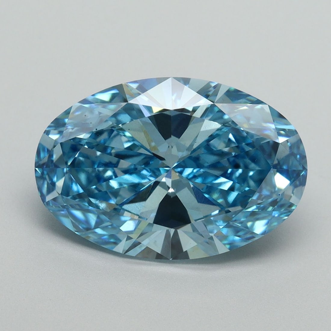 Loose Diamond - OVAL 5.07ct Fancy Vivid Blue VS2: Loose Diamond - OVAL 5.07ct Fancy Vivid Blue VS2 Source: This is a real non-mined Diamond that has been grown in a lab Shape: OVAL Carats: 5.07 Color: Fancy Vivid Blue Certification: IGI Video: