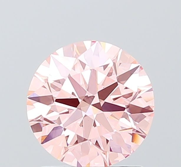 Ideal Loose Diamond - ROUND 1.54ct Fancy Vivid Pink VVS2: Ideal Loose Diamond - ROUND 1.54ct Fancy Vivid Pink VVS2 Source: This is a real non-mined Diamond that has been grown in a lab Shape: ROUND Carats: 1.54 Color: Fancy Vivid Pink Certification: IGI Addi