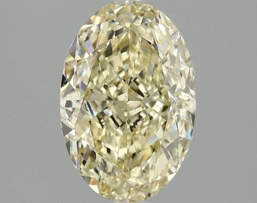 Loose Diamond - OVAL 2.1ct Fancy Intense Yellow VS2: Loose Diamond - OVAL 2.1ct Fancy Intense Yellow VS2 Source: This is a real non-mined Diamond that has been grown in a lab Shape: OVAL Carats: 2.1 Color: Fancy Intense Yellow Certification: IGI Video: