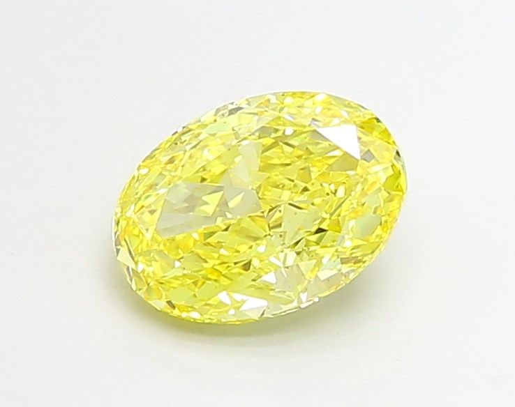 Loose Diamond - OVAL 2.0ct Fancy Vivid Yellow VVS2: Loose Diamond - OVAL 2.0ct Fancy Vivid Yellow VVS2 Source: This is a real non-mined Diamond that has been grown in a lab Shape: OVAL Carats: 2.0 Color: Fancy Vivid Yellow Certification: IGI Video: