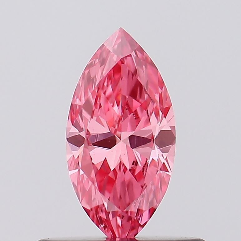 Loose Diamond - MARQUISE 0.38ct Fancy Vivid Pink VS2: Loose Diamond - MARQUISE 0.38ct Fancy Vivid Pink VS2 Source: This is a real non-mined Diamond that has been grown in a lab Shape: MARQUISE Carats: 0.38 Color: Fancy Vivid Pink Certification: IGI Video