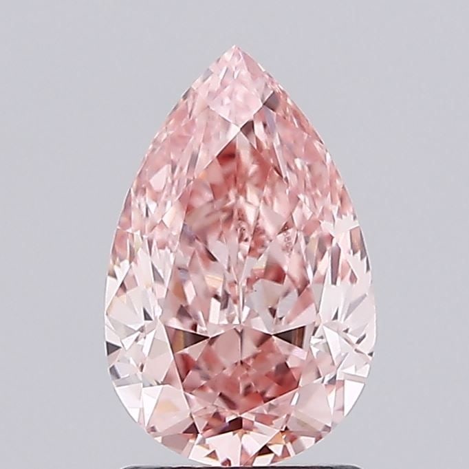 Loose Diamond - PEAR 1.95ct Fancy Vivid Pink VS1: Loose Diamond - PEAR 1.95ct Fancy Vivid Pink VS1 Source: This is a real non-mined Diamond that has been grown in a lab Shape: PEAR Carats: 1.95 Color: Fancy Vivid Pink Certification: IGI Video: