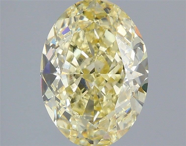 Loose Diamond - OVAL 3.1ct Fancy Intense Yellow VS1: Loose Diamond - OVAL 3.1ct Fancy Intense Yellow VS1 Source: This is a real non-mined Diamond that has been grown in a lab Shape: OVAL Carats: 3.1 Color: Fancy Intense Yellow Certification: IGI Video: