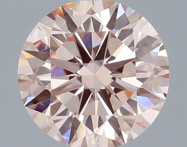 Loose Diamond - ROUND 0.66ct Fancy Intense Pink VS1: Loose Diamond - ROUND 0.66ct Fancy Intense Pink VS1 Source: This is a real non-mined Diamond that has been grown in a lab Shape: ROUND Carats: 0.66 Color: Fancy Intense Pink Certification: IGI Video: