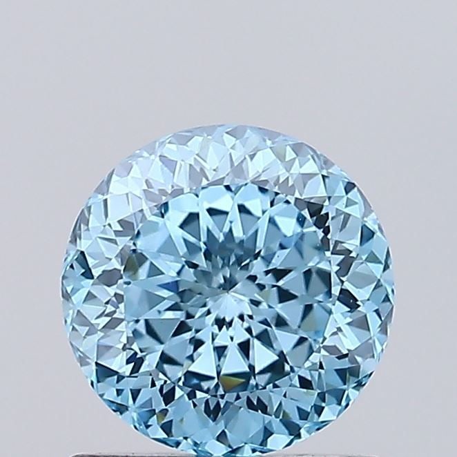 Loose Diamond - ROUND 0.85ct Fancy Vivid Blue VS1: Loose Diamond - ROUND 0.85ct Fancy Vivid Blue VS1 Source: This is a real non-mined Diamond that has been grown in a lab Shape: ROUND Carats: 0.85 Color: Fancy Vivid Blue Certification: IGI Video: