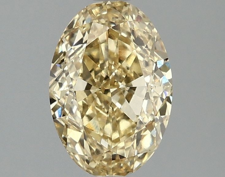 Loose Diamond - OVAL 1.58ct Fancy Vivid Yellow VS2: Loose Diamond - OVAL 1.58ct Fancy Vivid Yellow VS2 Source: This is a real non-mined Diamond that has been grown in a lab Shape: OVAL Carats: 1.58 Color: Fancy Vivid Yellow Certification: IGI Video: