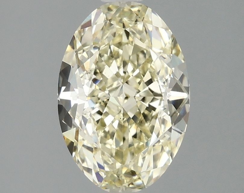 Loose Diamond - OVAL 2.1ct Fancy Yellow VS1: Loose Diamond - OVAL 2.1ct Fancy Yellow VS1 Source: This is a real non-mined Diamond that has been grown in a lab Shape: OVAL Carats: 2.1 Color: Fancy Yellow Certification: IGI Video: