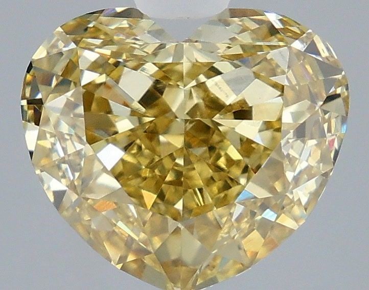 Loose Diamond - HEART 3.09ct Fancy Intense Yellow VVS2: Loose Diamond - HEART 3.09ct Fancy Intense Yellow VVS2 Source: This is a real non-mined Diamond that has been grown in a lab Shape: HEART Carats: 3.09 Color: Fancy Intense Yellow Certification: IGI Vi