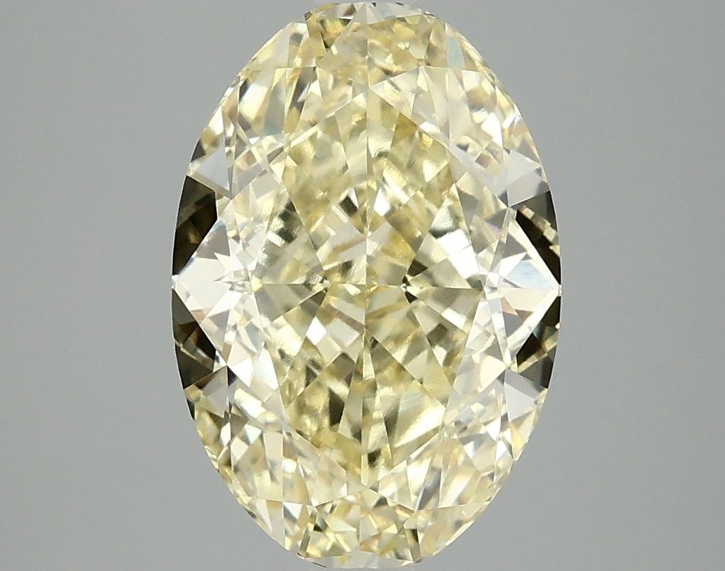 Loose Diamond - OVAL 4.09ct Fancy Intense Yellow VVS2: Loose Diamond - OVAL 4.09ct Fancy Intense Yellow VVS2 Source: This is a real non-mined Diamond that has been grown in a lab Shape: OVAL Carats: 4.09 Color: Fancy Intense Yellow Certification: IGI
