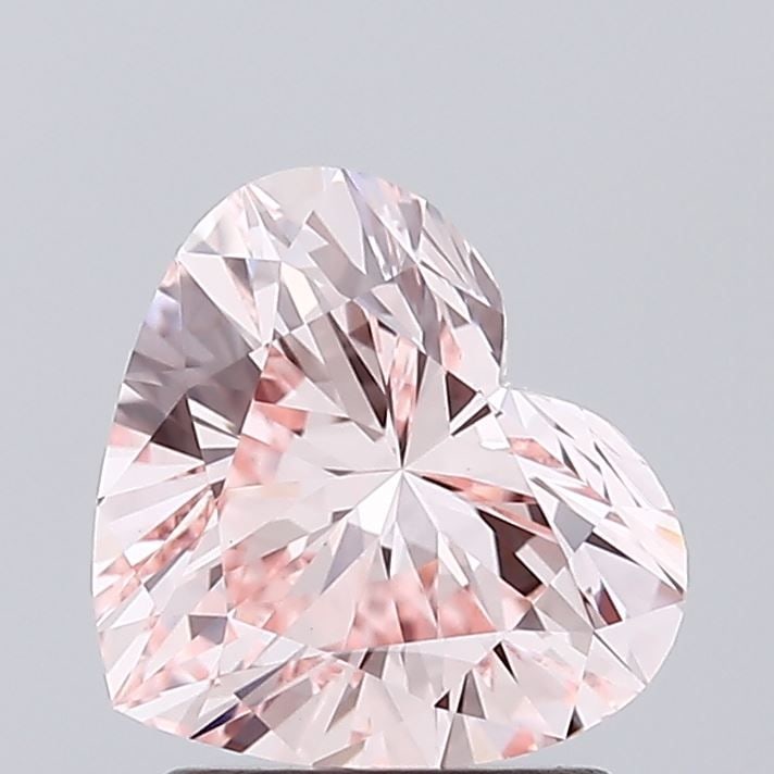 Loose Diamond - HEART 1.49ct Fancy Vivid Pink VVS2: Loose Diamond - HEART 1.49ct Fancy Vivid Pink VVS2 Source: This is a real non-mined Diamond that has been grown in a lab Shape: HEART Carats: 1.49 Color: Fancy Vivid Pink Certification: IGI Video: