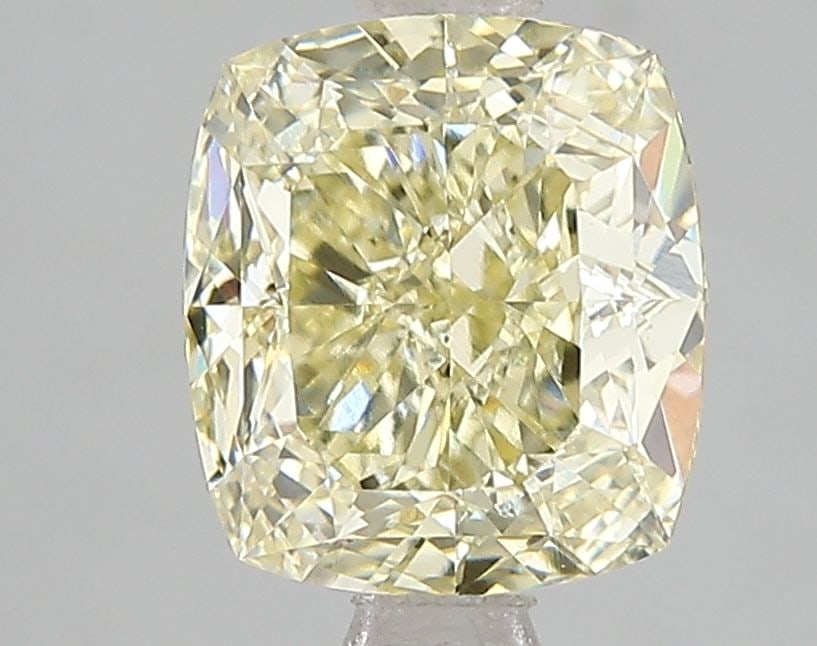 Loose Diamond - CUSHION MODIFIED 2.58ct Fancy Yellow VS1: Loose Diamond - CUSHION MODIFIED 2.58ct Fancy Yellow VS1 Source: This is a real non-mined Diamond that has been grown in a lab Shape: CUSHION MODIFIED Carats: 2.58 Color: Fancy Yellow Certification: I