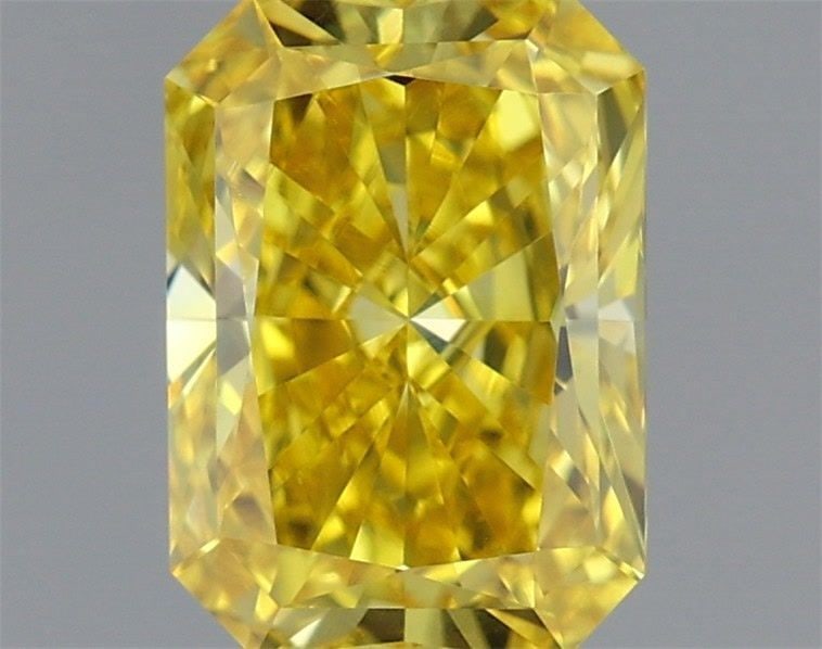 Loose Diamond - RADIANT 0.81ct Fancy Vivid Yellow VVS2: Loose Diamond - RADIANT 0.81ct Fancy Vivid Yellow VVS2 Source: This is a real non-mined Diamond that has been grown in a lab Shape: RADIANT Carats: 0.81 Color: Fancy Vivid Yellow Certification: IGI Vi