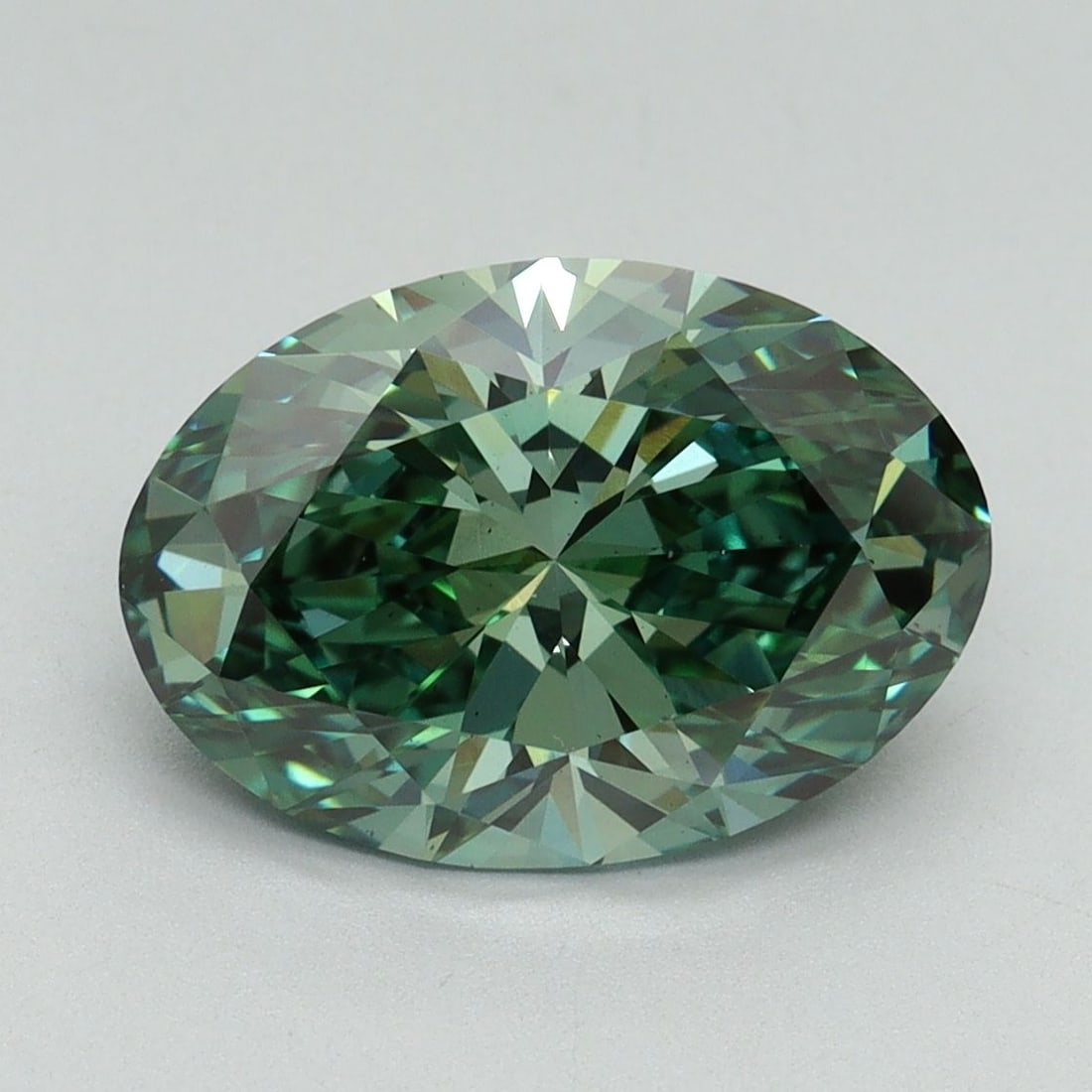 Loose Diamond - OVAL 3.26ct Fancy Vivid Green VS2: Loose Diamond - OVAL 3.26ct Fancy Vivid Green VS2 Source: This is a real non-mined Diamond that has been grown in a lab Shape: OVAL Carats: 3.26 Color: Fancy Vivid Green Certification: IGI Video: